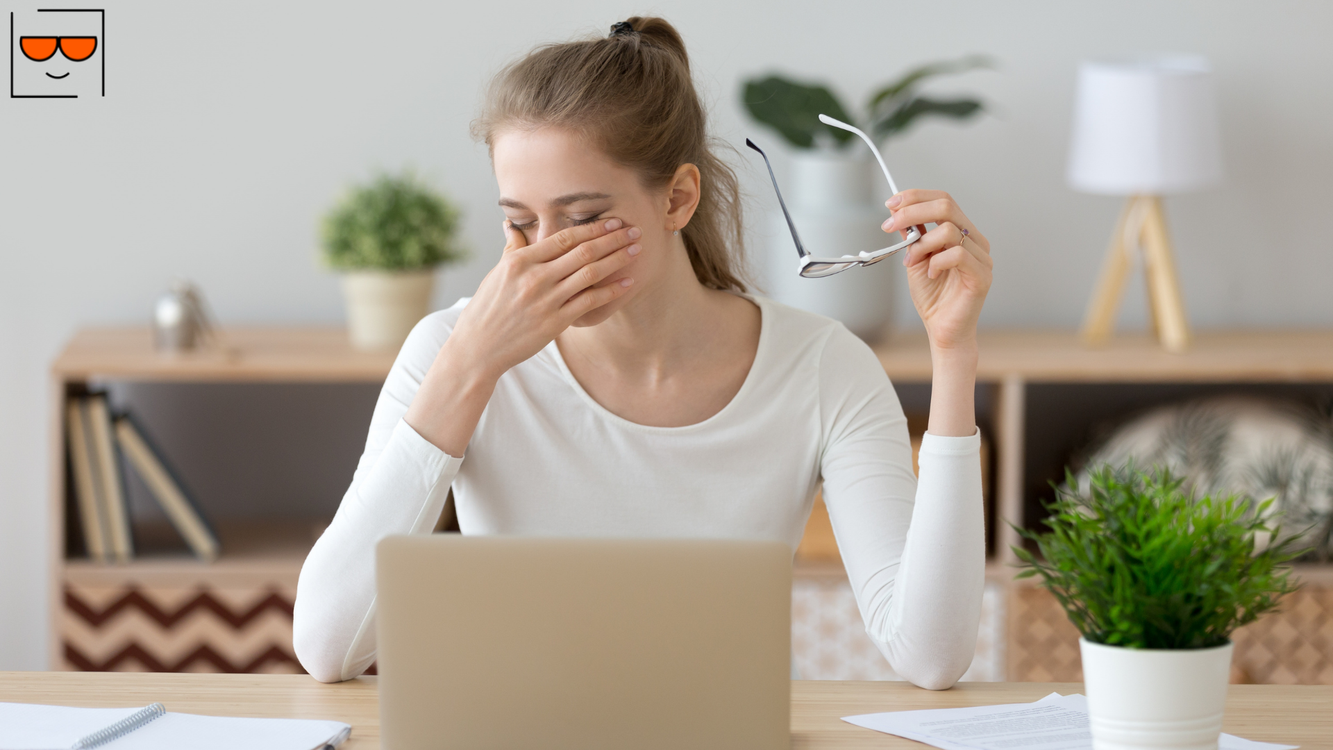 Woman rubbing her eyes due to eye strain